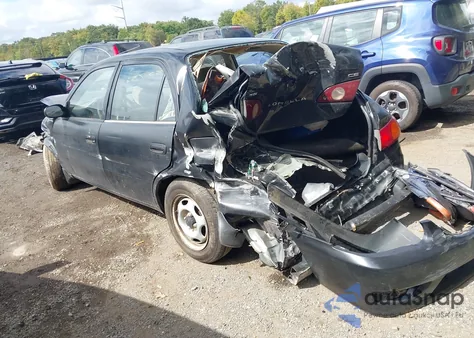 2001 Toyota Corolla Ce from USA, damaged, VIN 2T1BR12E21C388319